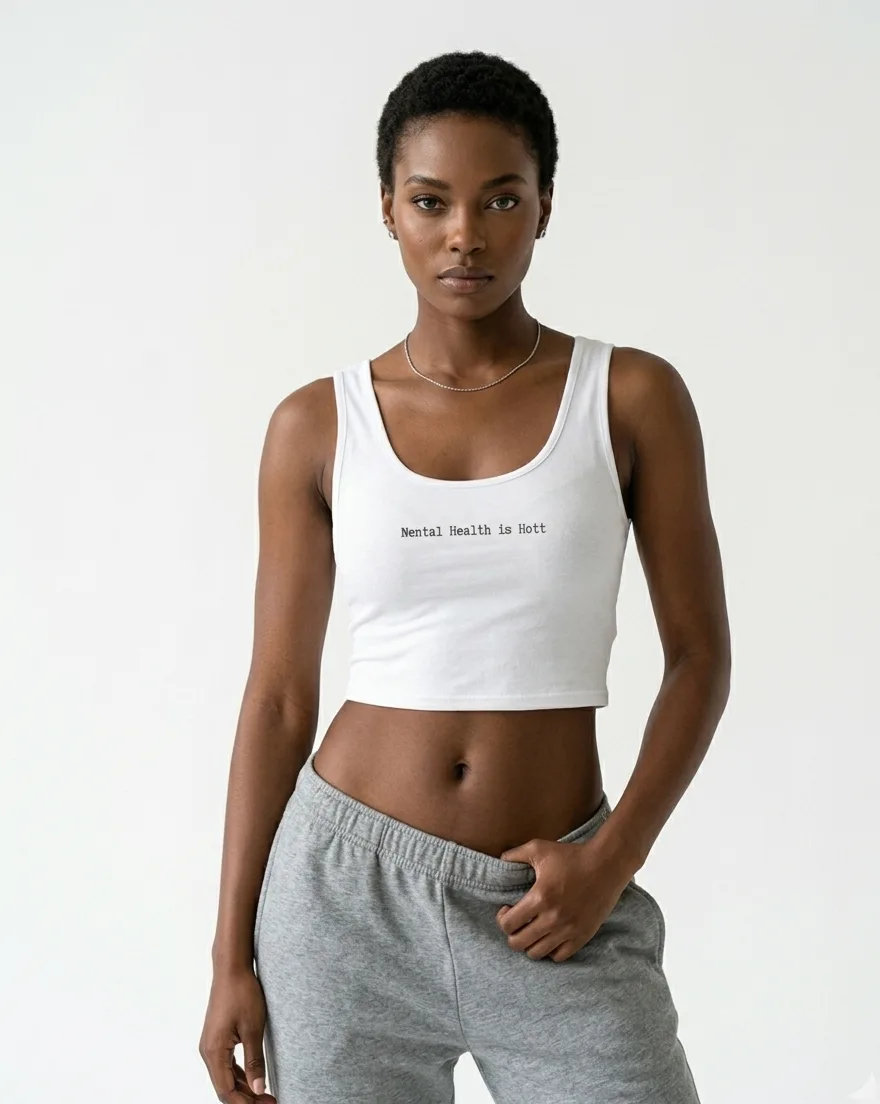 Woman wearing the Mental Health Is Hott Crop Top
