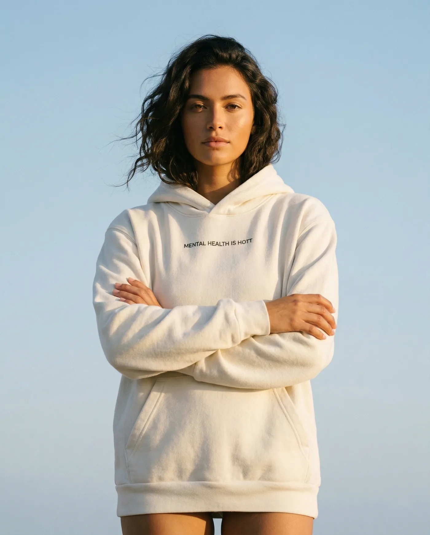 Woman wearing the Ivory Room Hoodie